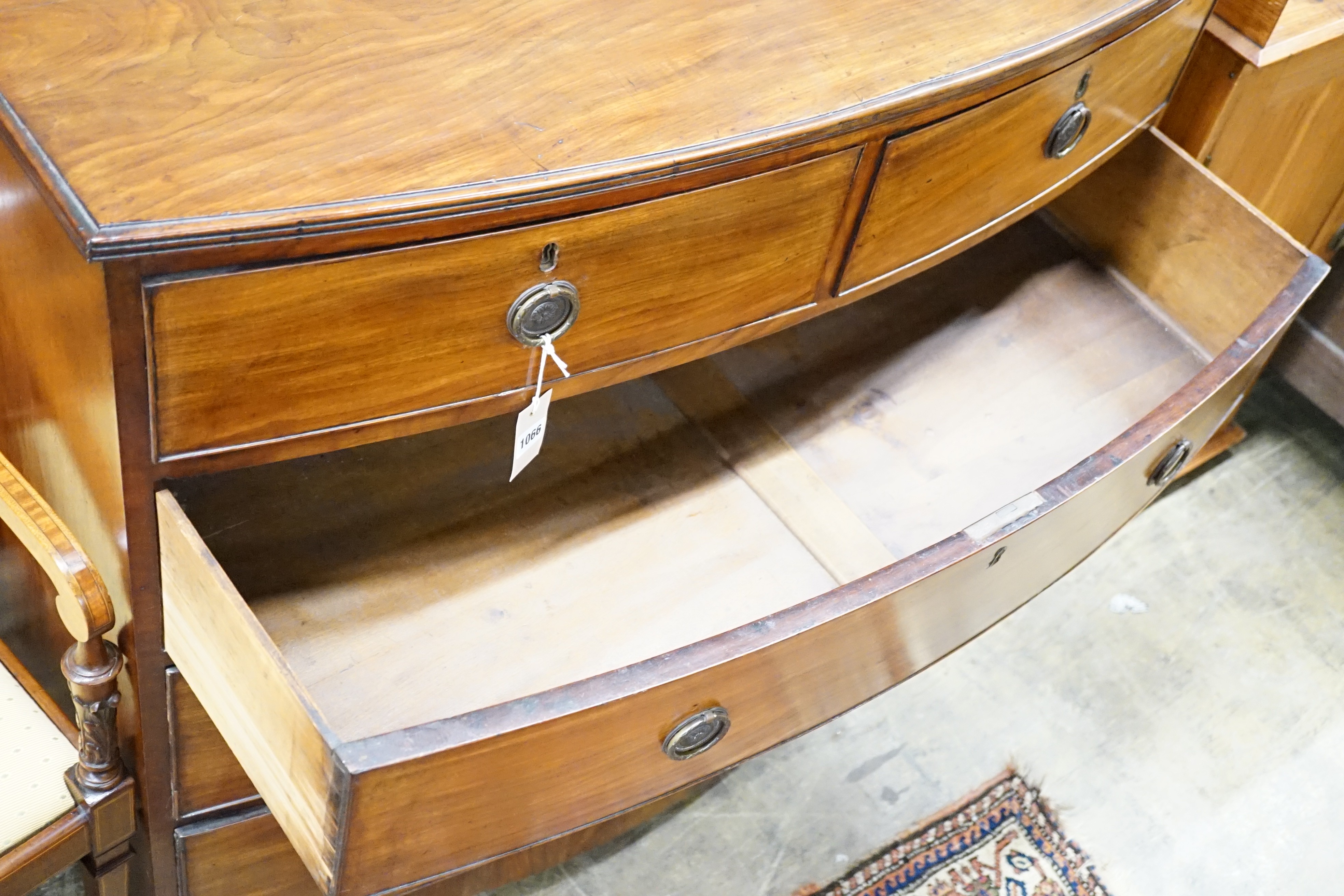 A Regency bow fronted mahogany chest of two short and three long drawers, width 108cm, height 100cm